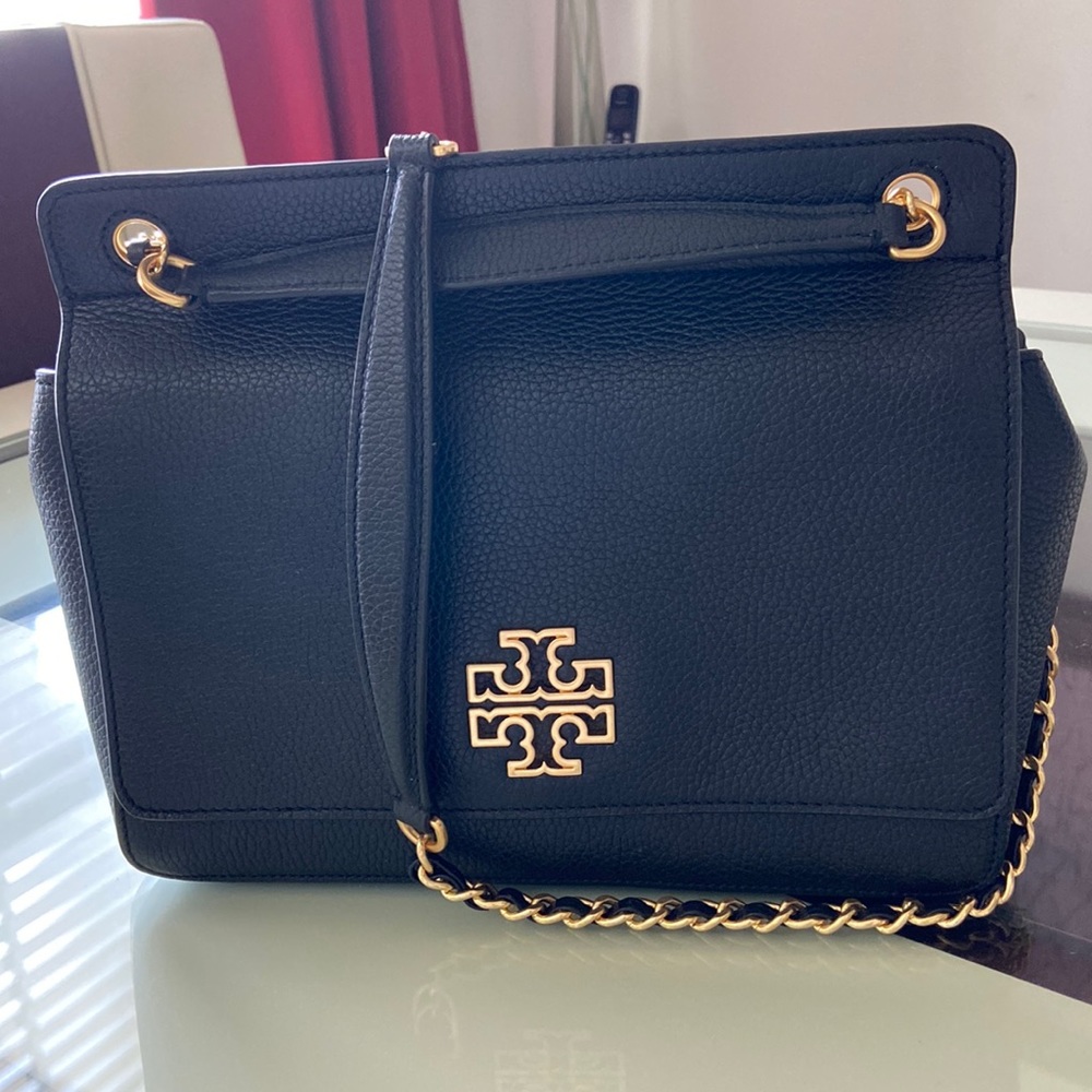 Tory Burch authentic britten Flap Shoulder Bag. used one time . No flaws